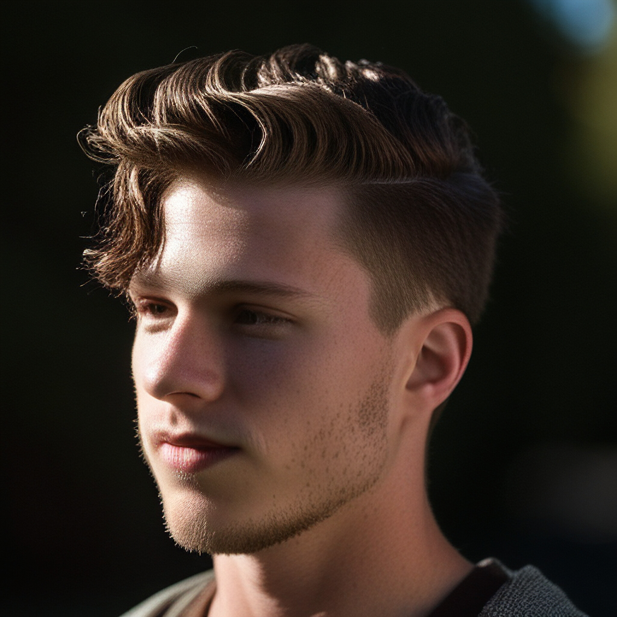 Check out this stylish low fade haircut! The subtle contrast between the short sides and longer top section creates a sophisticated look that's perfect for everyday wear. Whether you're looking to update your style or just want a fresh new 'do, this low fade haircut is definitely worth considering.